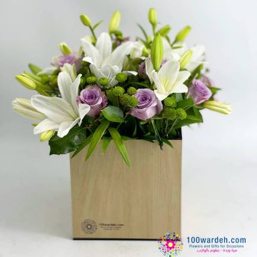 Beautiful flowers box violet roses and white lilies
