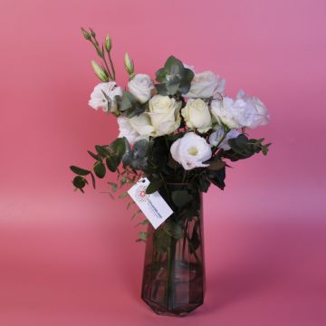 White roses and flowers vase