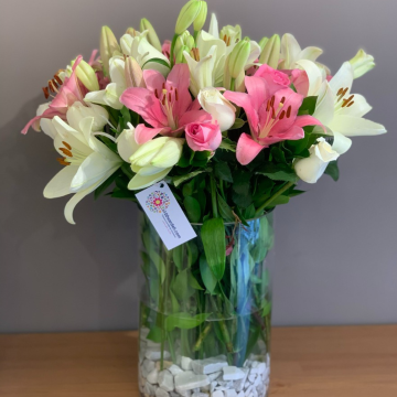 Premium white and pink lilies and roses