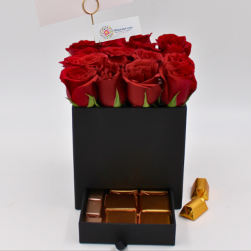 red roses box with chocolate